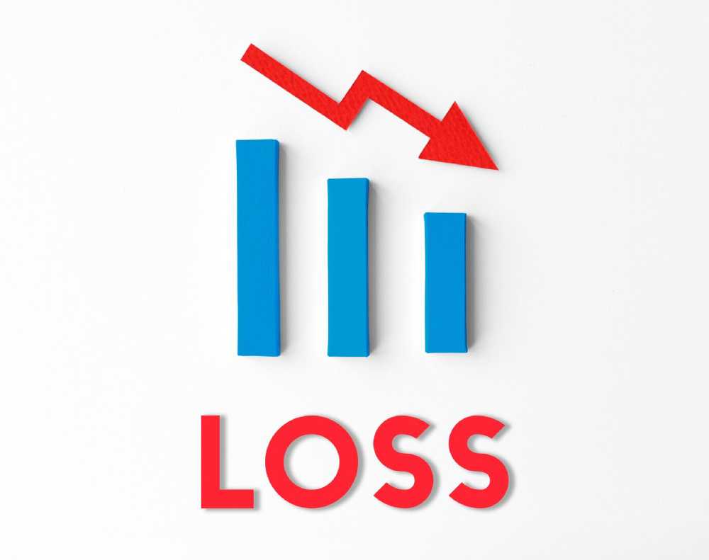 A visual representation of financial loss: three blue bar graphs decreasing in height with a red downward arrow and the word 