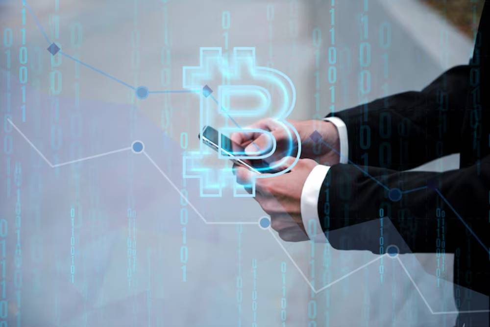 A businessman holding a smartphone, with a glowing Bitcoin symbol and digital data overlays, indicating cryptocurrency activity.